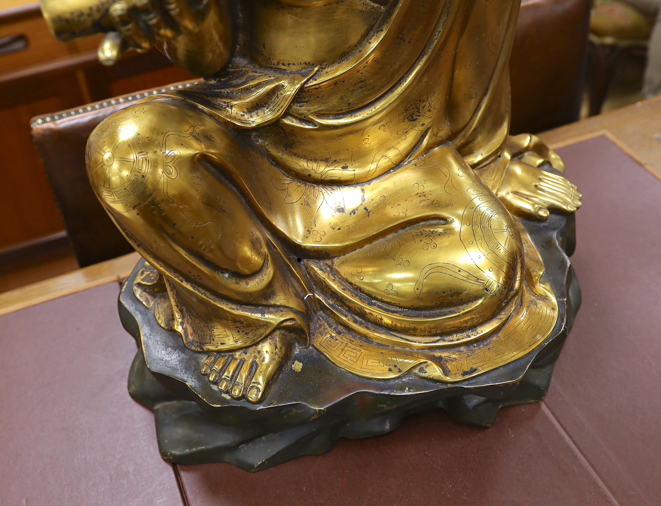 A large Chinese bronze seated figure of a Luohan, 20th century, height 72cm.